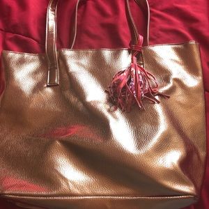 Gold purse with colored tassel